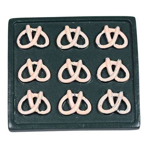 Sheet with sugar pretzels for Elf Door